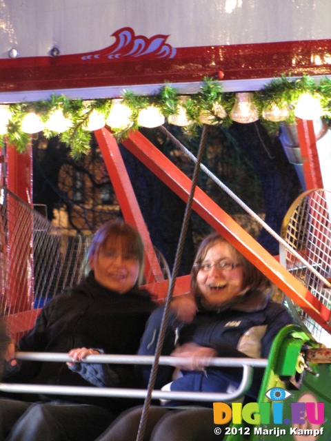 SX25409 Lib and Jenni on ferris wheel at Cardiff Winter Wonderland